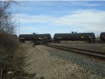  looking northeast at pile of ties at east end of wye & at UP 9048 heading south